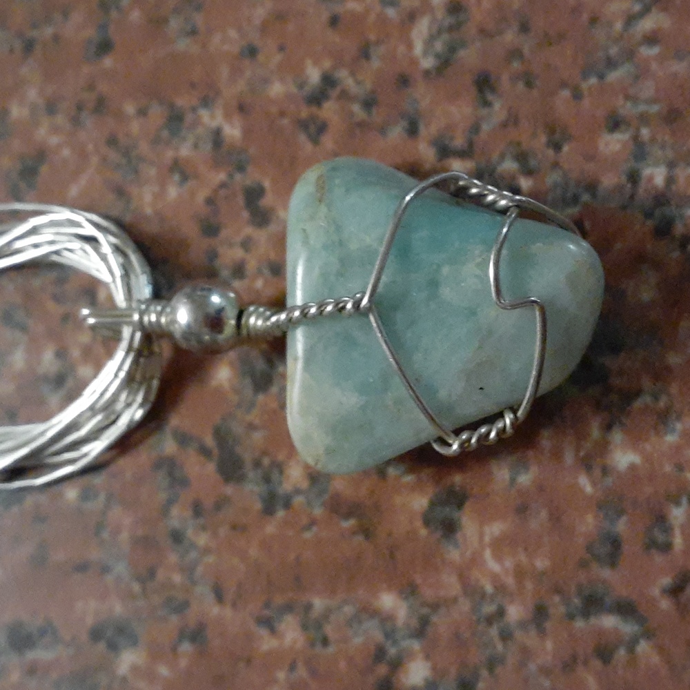 southwest style liquid silver strand necklace  with a turquoise pendant